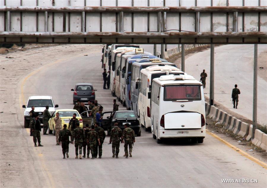 SYRIA-EASTERN GHOUTA-HARASTA-REBELS-EVACUATION