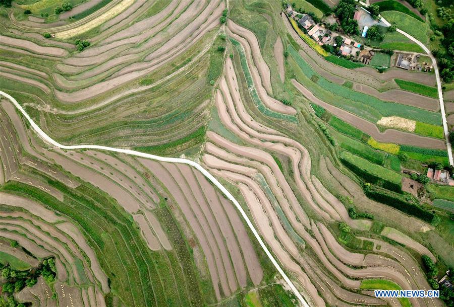 CHINA-GANSU-HUINING-TERRACED LANDS IN RAIN (CN)