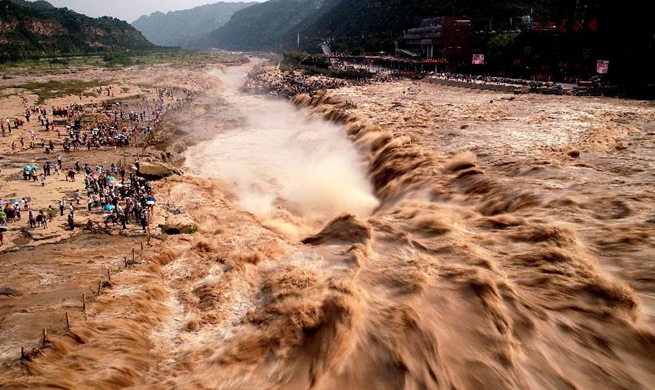 Aerial view of Yellow River's Hukou Waterfall in flood season in N China's Shanxi