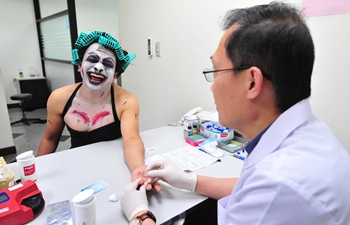 People dresses up to donate blood during Halloween in Bangkok, Thailand