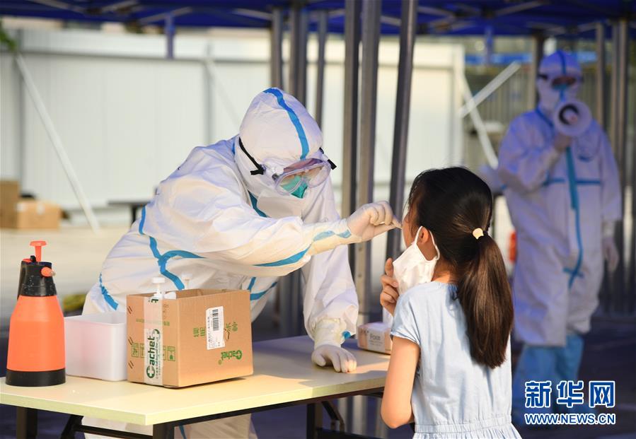 （新华全媒头条·图文互动）（1）构筑守护城市、守护生命的坚强防线——北京开展大规模核酸检测